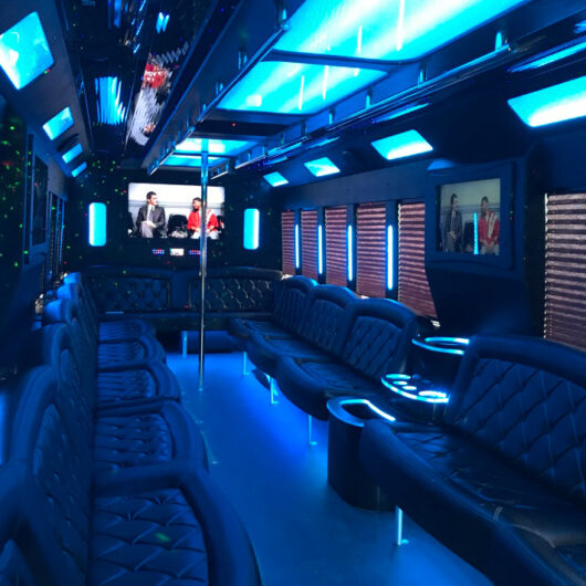 40 passenger party bus with limousine style seating, entertainer's dance pole, party accent lighting