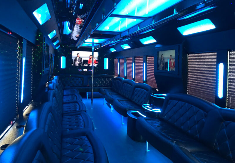 40 passenger party bus with limousine style seating, entertainer's dance pole, party accent lighting
