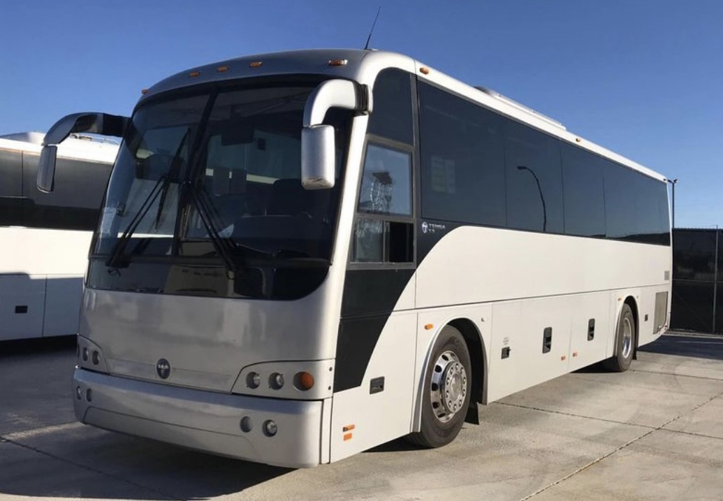 50 passenger white coach bus exterior