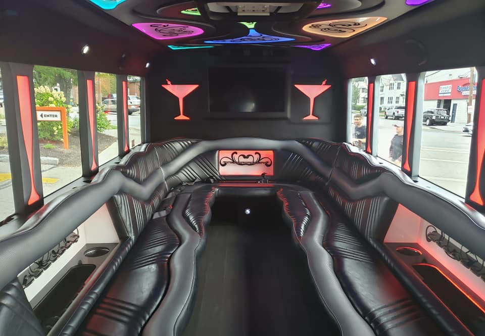 20 person party bus interior with wet bar, party lights, limousine u shaped seating