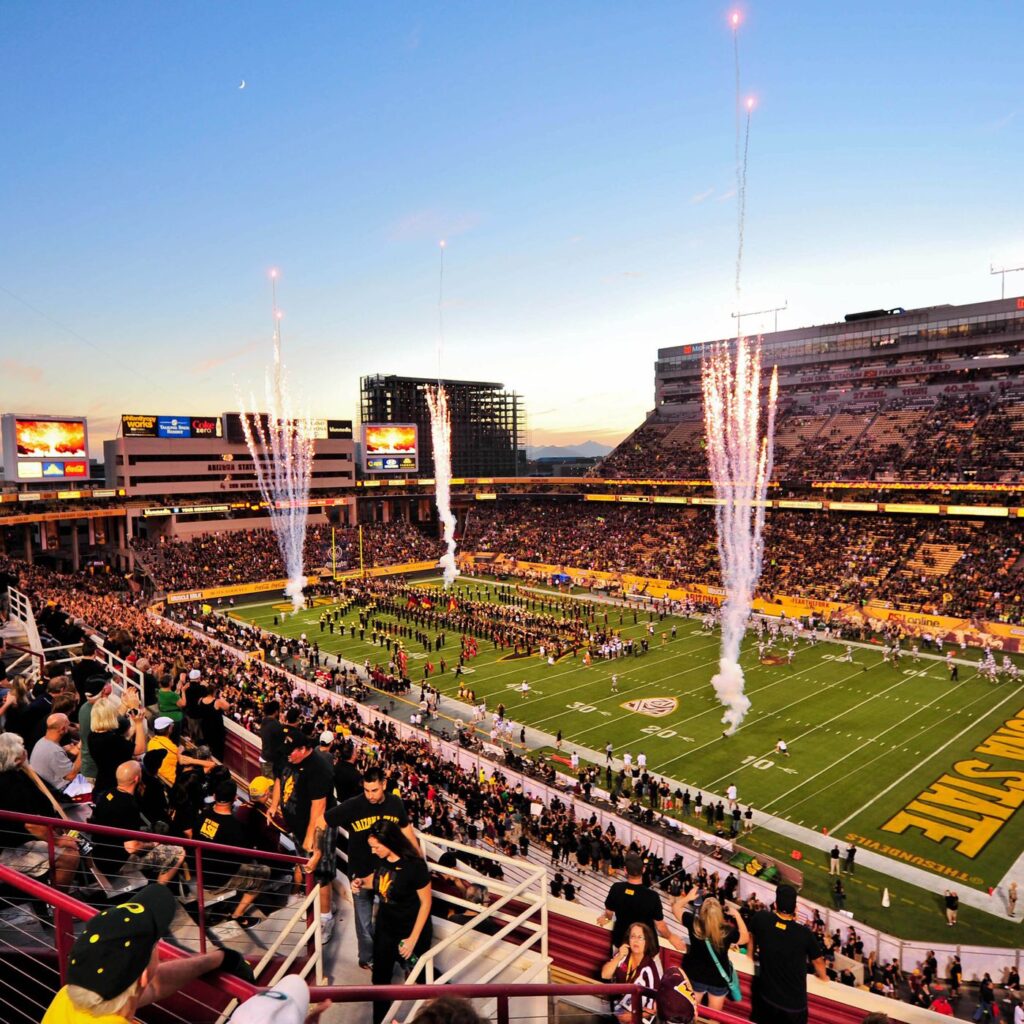 ASU football stadium, group cheering in the stands