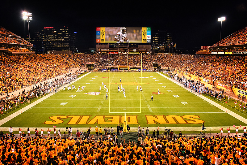 Sun Devil Stadium in Tempe AZ, football team playing game and fans cheering