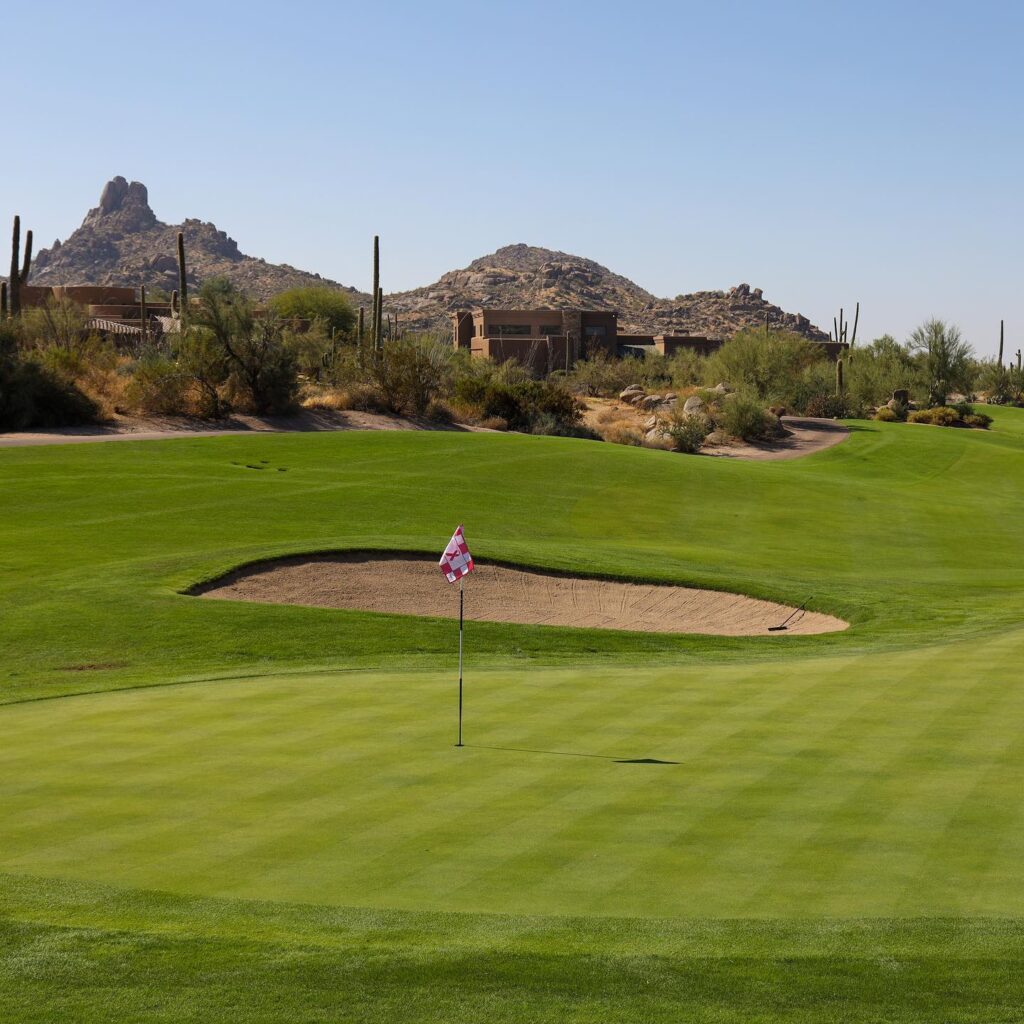 Putting green and flag pole at Troon North golf club